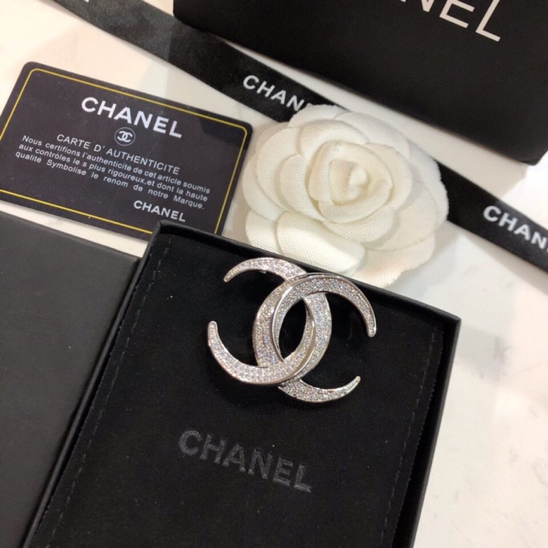 Ch*el brooches